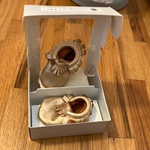 Freshly picked size 2 moccasin color Rose gold.